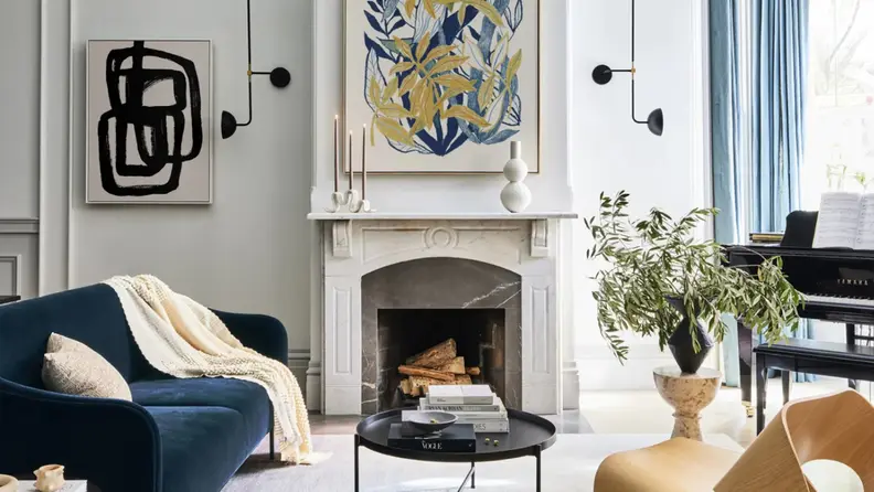 Minted home goods and art in display in a room.