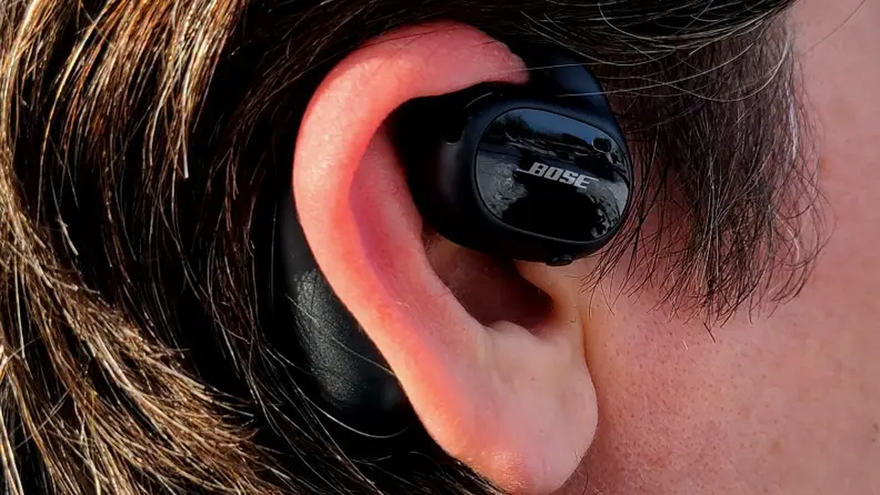 Bose Sport Open Earbuds close up earbud on right ear