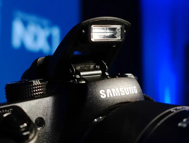 The NX1 should work well in limited light, but it has a built-in flash as well.