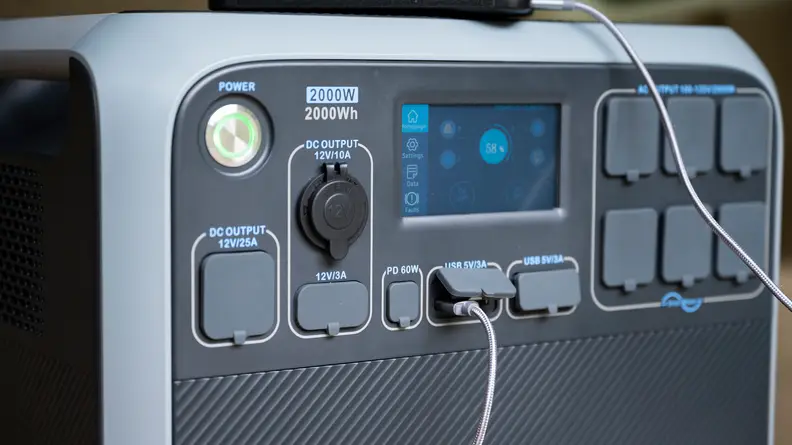 Close up of power outlets and ports on a power generator.