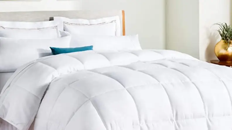 the linenspa comforter on a mattress