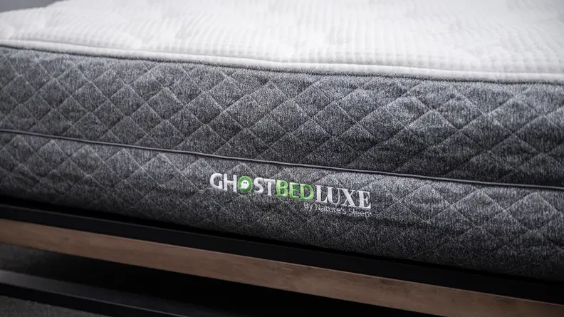 Close-up shot of the side of the mattress revealing the GhostBed logo.