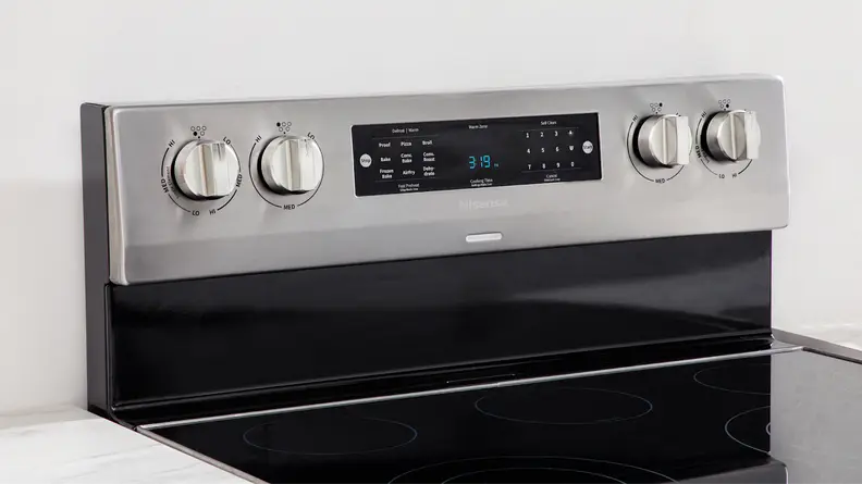 Close-up shot of the control panel on the Hisense HBE3501CPS 30-in Freestanding Electric Range.