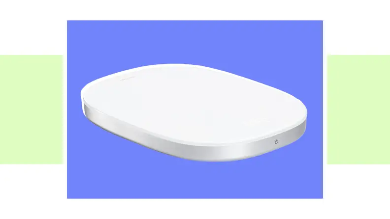 An image of a flat, thin white kitchen scale.