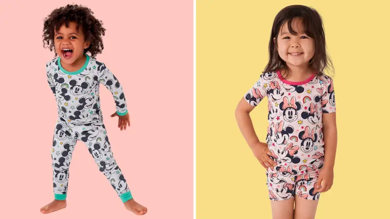 Two children wearing Little Sleepies Micky and Minnie Mouse PJs