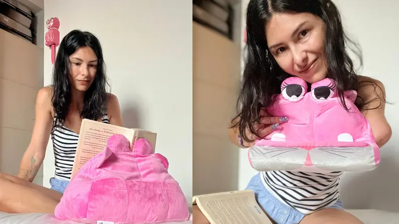 Two panel image: On left a woman reading from the Cuddly Reader book stand. On right, the woman holds the pink pillow stand in front of her. The pillow looks like a pink dragon with large eyes.