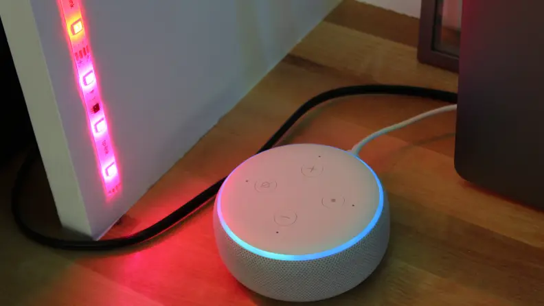LED strip lights installed next to an Echo Dot smart speaker