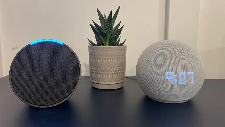 The Echo Pop next to the Echo Dot with clock