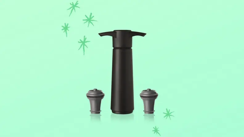 A VacuVin vacuum pump and two rubber corks against a green background with hand-drawn stars