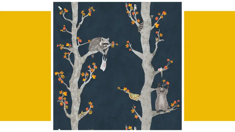 A wallcovering showing a pair of trees with raccoons on them.