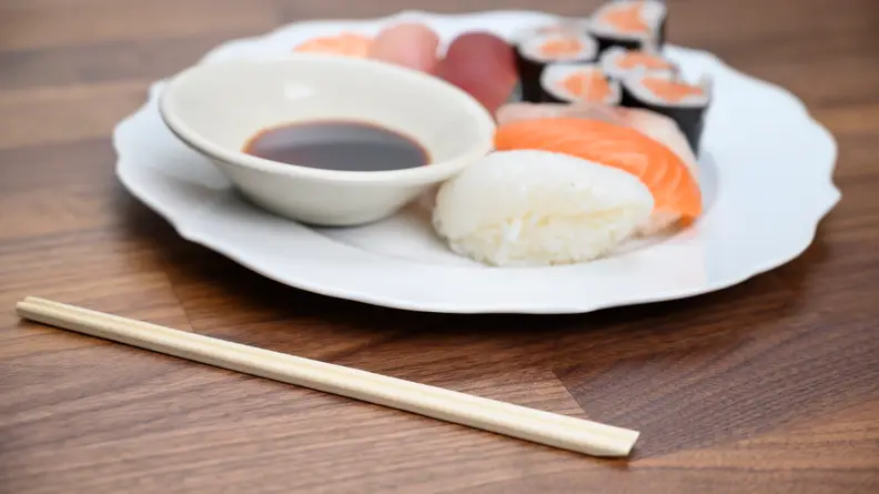 How to use chopsticks when eating sushi.