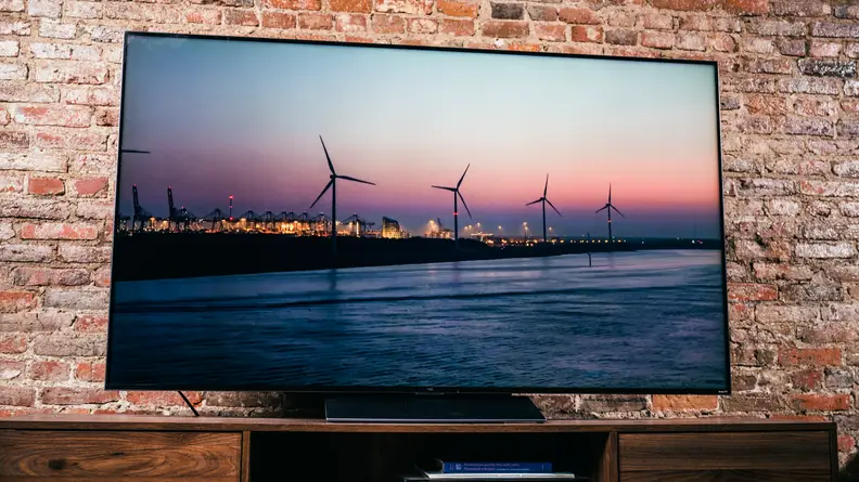 The TCL 6-Series 8K displaying high-resolution content in a living room setting