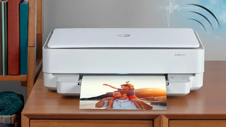 An image of a printer on a dresser.