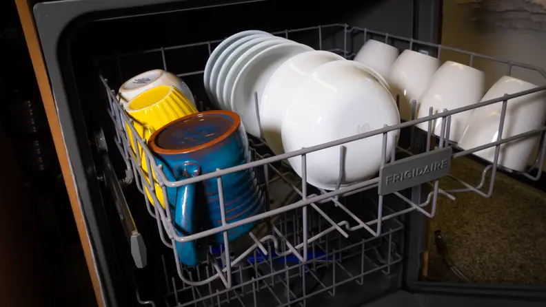 Cramped but functional, the upper rack can fit bowls and cups.