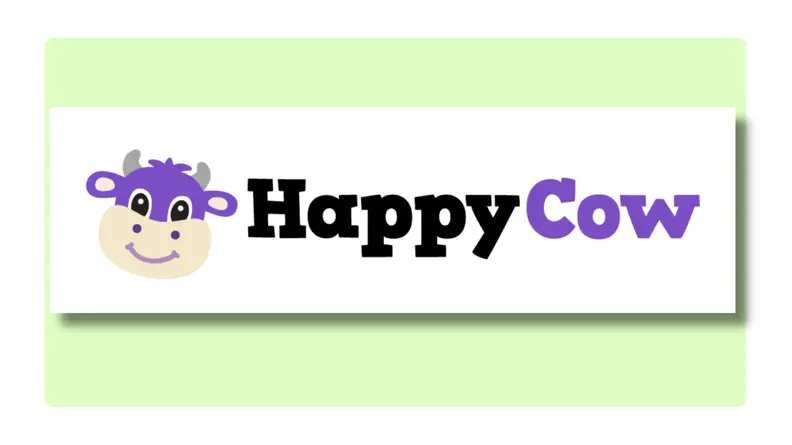 Happy Cow logo on green background.