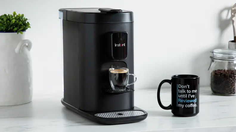 Product shot of the Instant Dual Pod Plus Coffee Maker on kitchen counter.