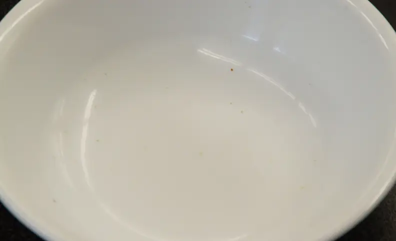The Frigidaire FFID2423, while a subpar performer by modern standards, completely obliterates our decade-old office dishwasher when it comes to cleaning spinach off a bowl.