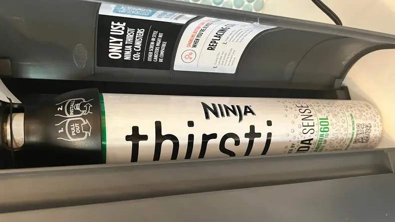 The Thirsti's CO2 canister installed in the machine.