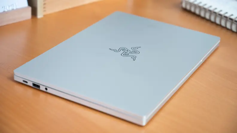 The top of the laptop is shown.