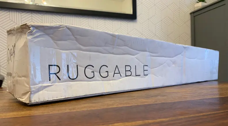 A side view of the Ruggable shipping box.