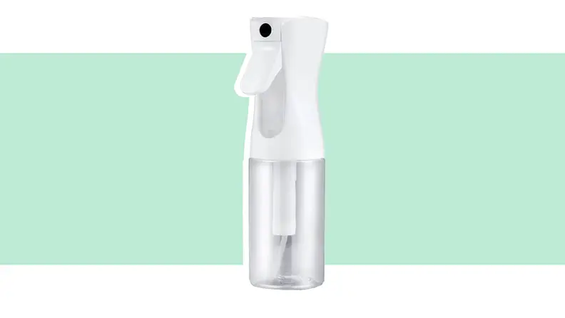 Clear and white misting spray bottle.