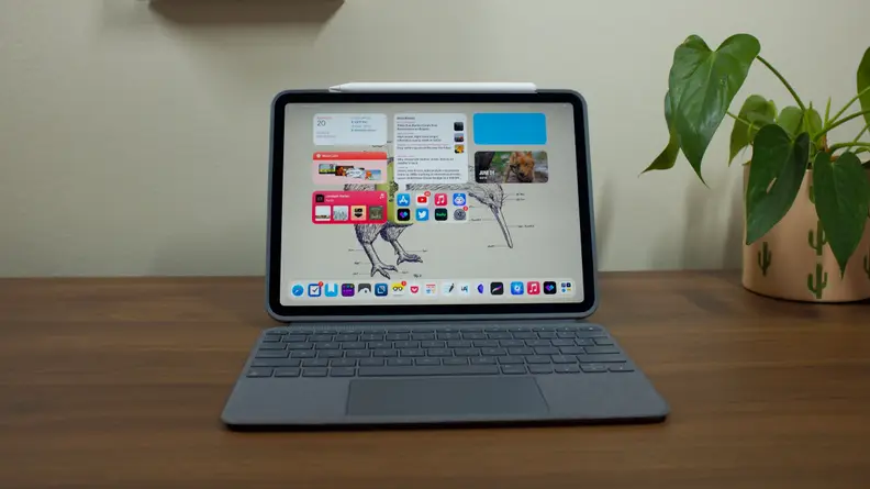 Logitech's Combo Touch attached to an iPad Air, sitting on a desk.