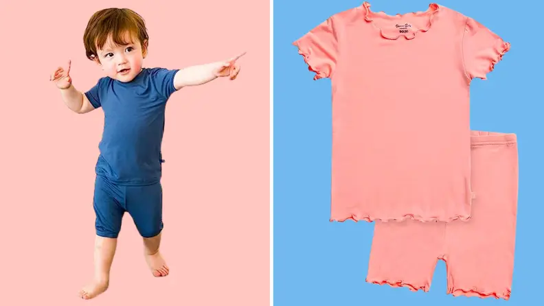 Kid wearing blue PJs next to a pink pair of PJs