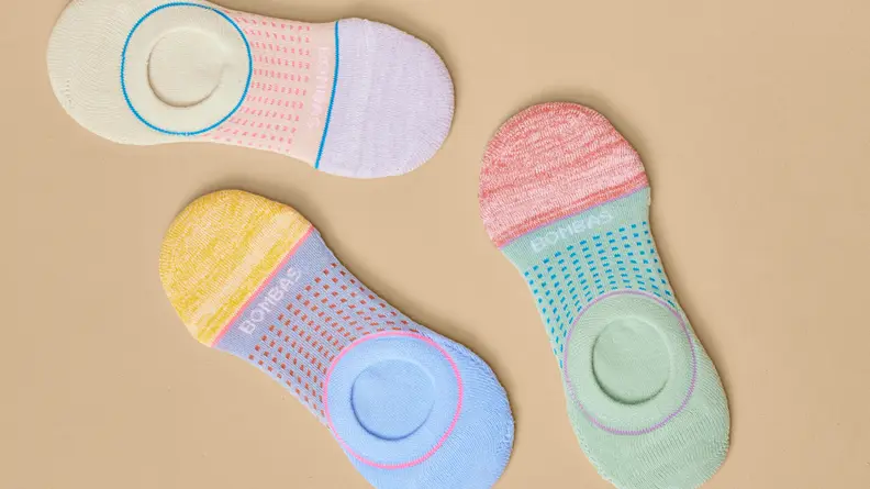 Bombas no-show socks on a beige background