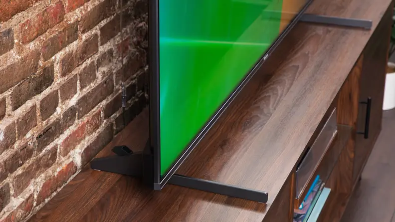 Close up shot of the angle of the TV and its stands.