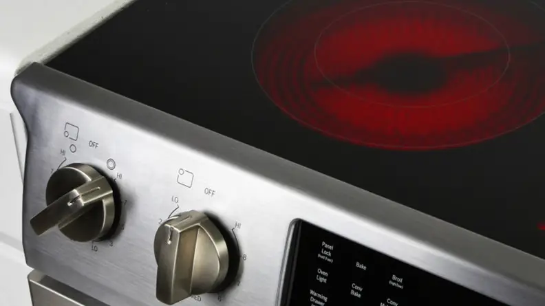 A close up of the control panel and cooktop of the Bosch HEI8054U electric range