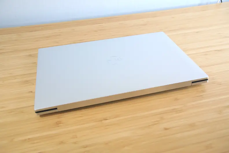 A closed laptop on a desk.