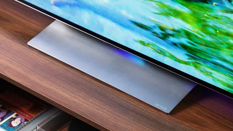 A flat TV stand on an LG OLED TV.