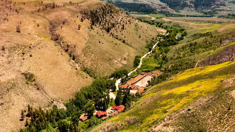 Aerial view of a guest ranch showing the whole area