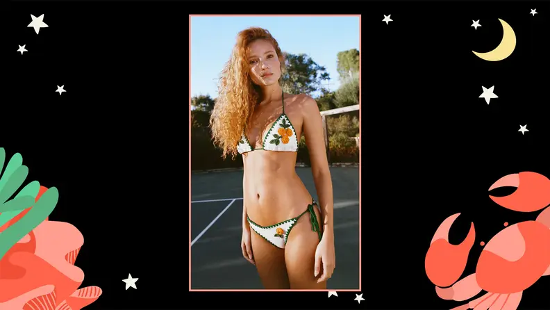 A crocheted bikini set featuring crocheted yellow roses.