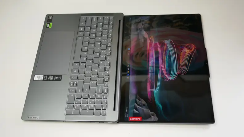 The laptop fully open in 180 degrees flat.