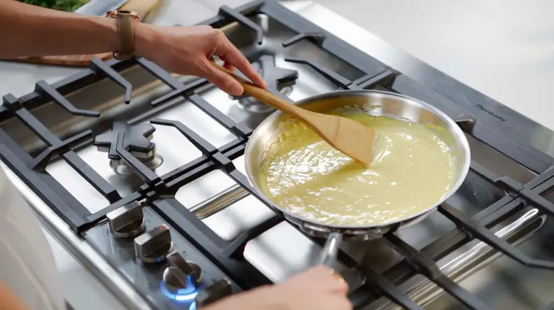 The center burner on the Thermador SGSX365TS gas cooktop has 16,000 BTUs, as well as an "extra low" simmer setting.