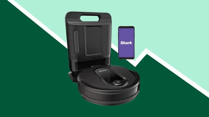 Image of robot vacuum against a green background