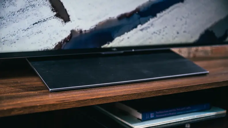 A close-up of the TCL 6-Series' wedge-shaped stand
