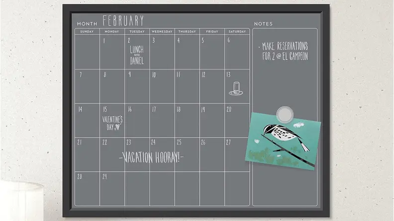 U Brands Magnetic Chalk Calendar Board hanging on a wall