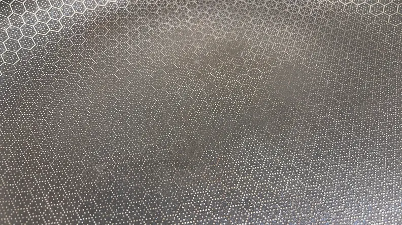 Closeup shot of the nonstick material inside of all of the Hexclad Hybrid cookware.