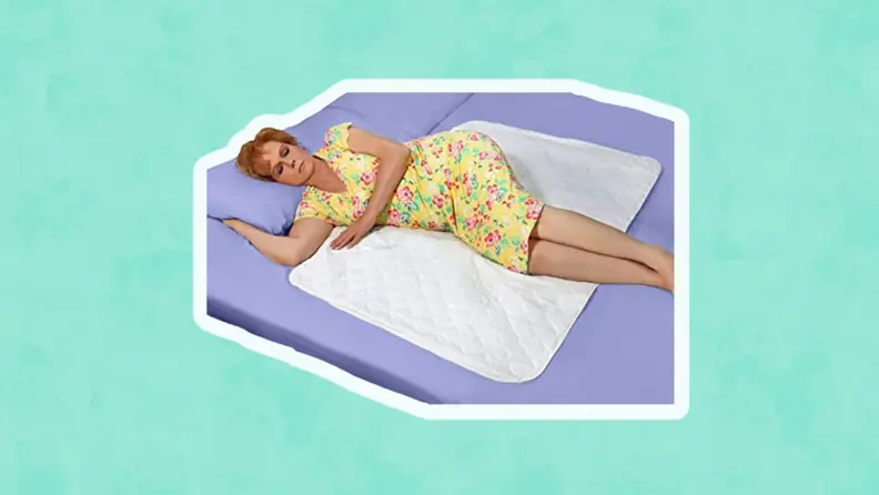 Woman sleeping on bed with white mat