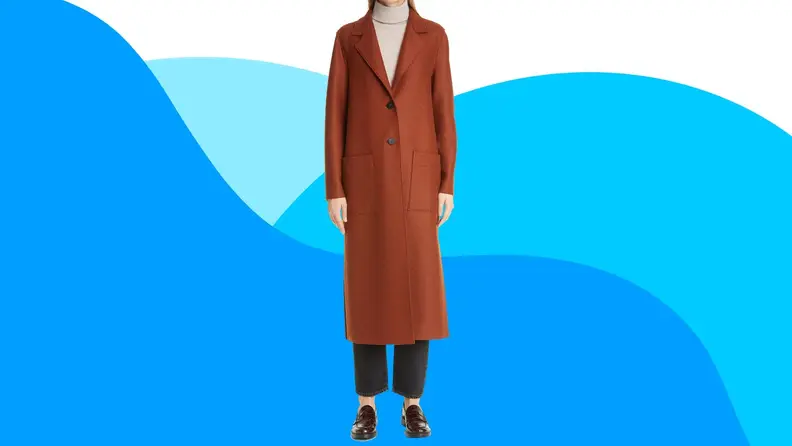 Person wearing clay colored longline coat.