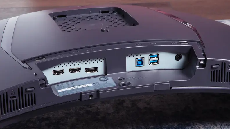 The underside of the LG UltraGear OLED 34GS95QE-B showing two USB-A ports, two HDMI ports, and a displayport port
