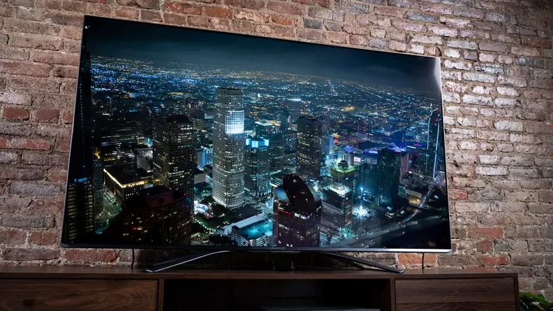 The Apple TV 4K's city screensaver on a TV