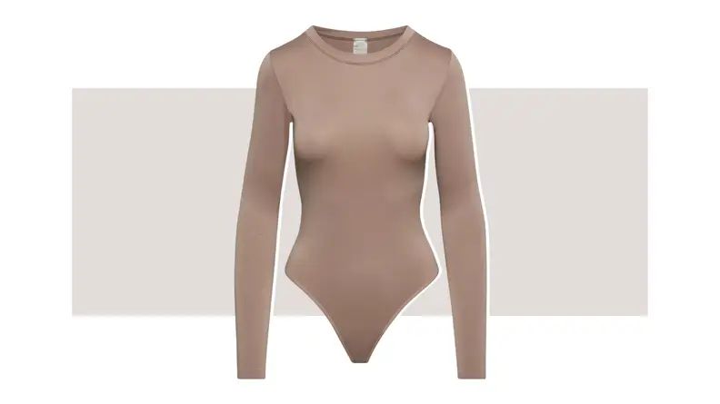 A taupe bodysuit with long sleeves.
