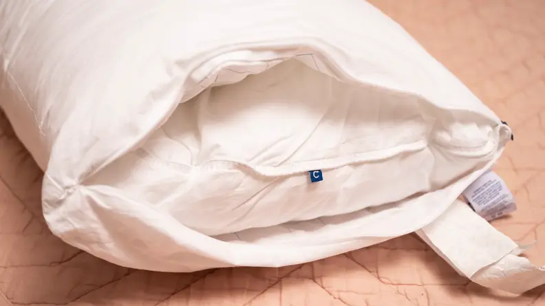 the casper pillow opened to reveal an outer shell and inner core