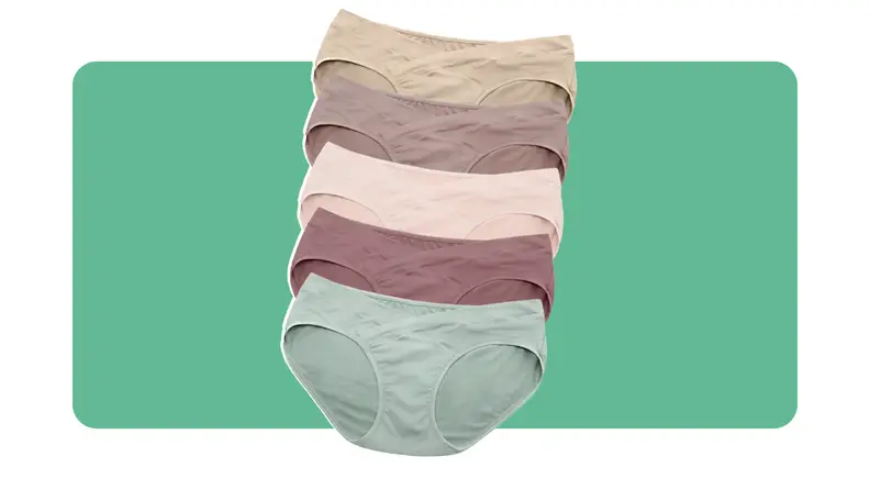 Product shot of stack of multicolored maternity underwear briefs from Kindred Bravely.