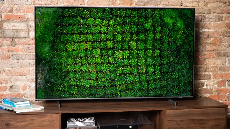 The Samsung Q60B displaying 4K/HDR content in a living room setting