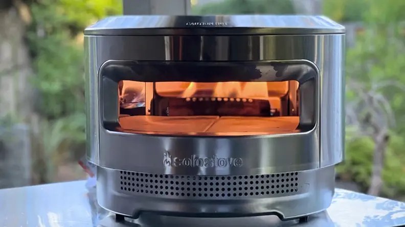 Interior of Solo Stove Pizza Oven outdoors.