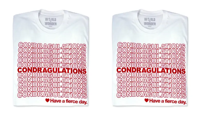 A simple white t-shirt with the phrase "Condragulations" written on it.